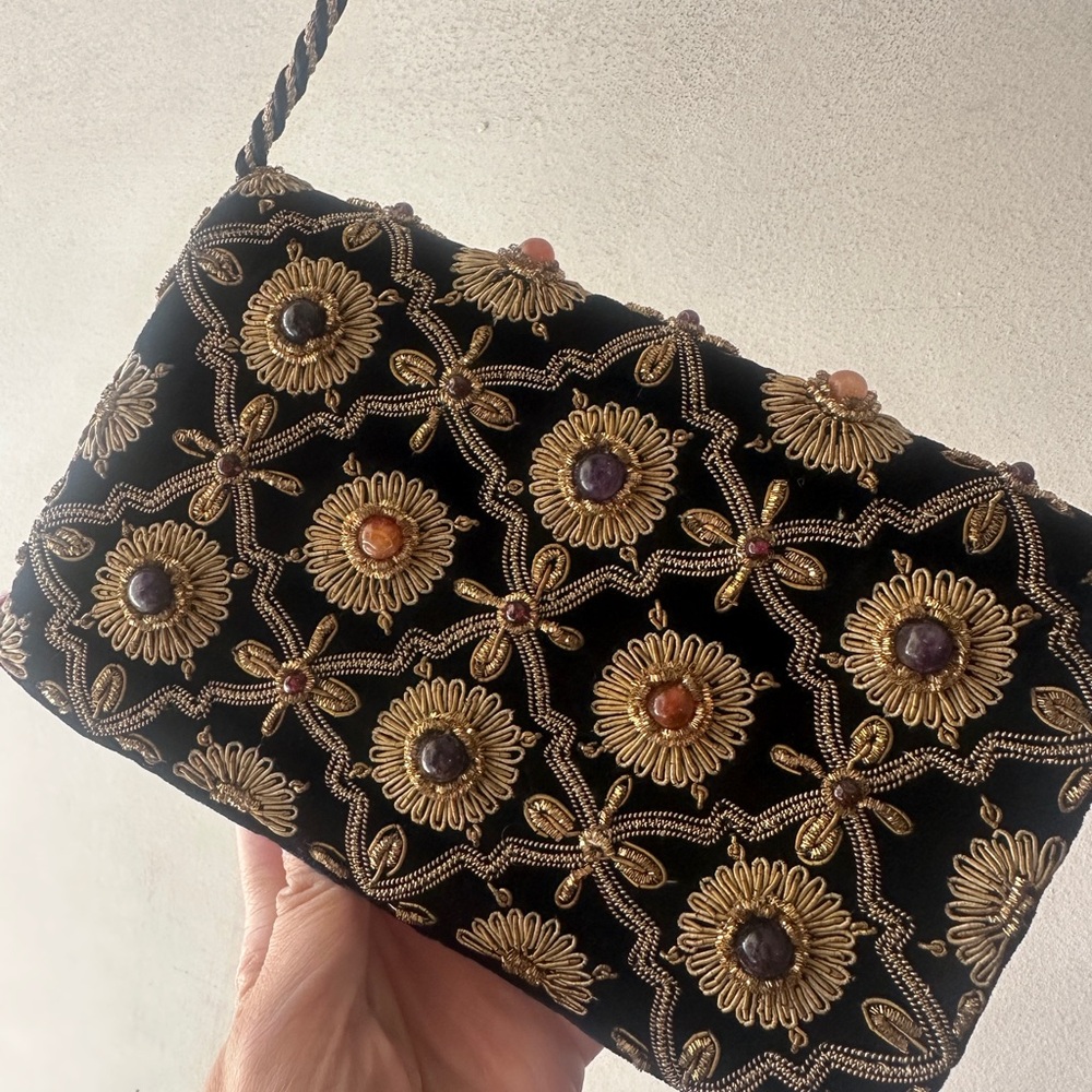 Elegant Black and Gold Embellished Clutch